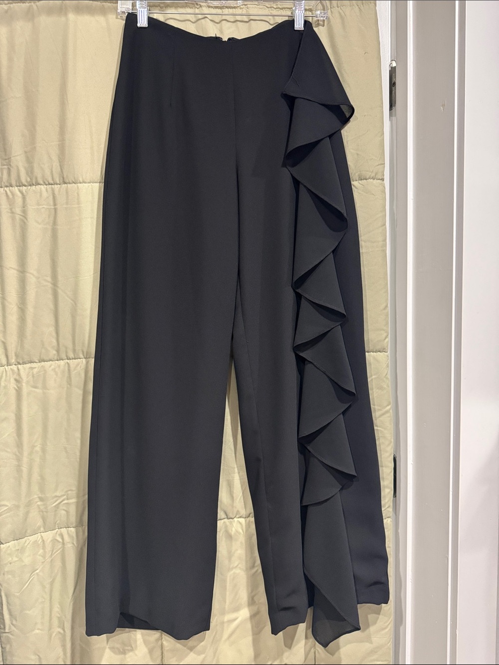 Women’s classic black pants with front drape on left leg